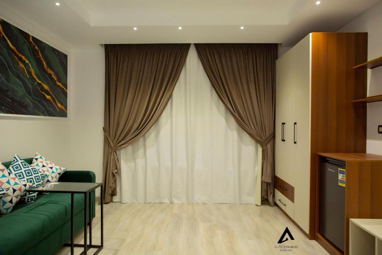Elite Pyramids Boutique Hotel Kafrat al Jabal Bagian luar foto