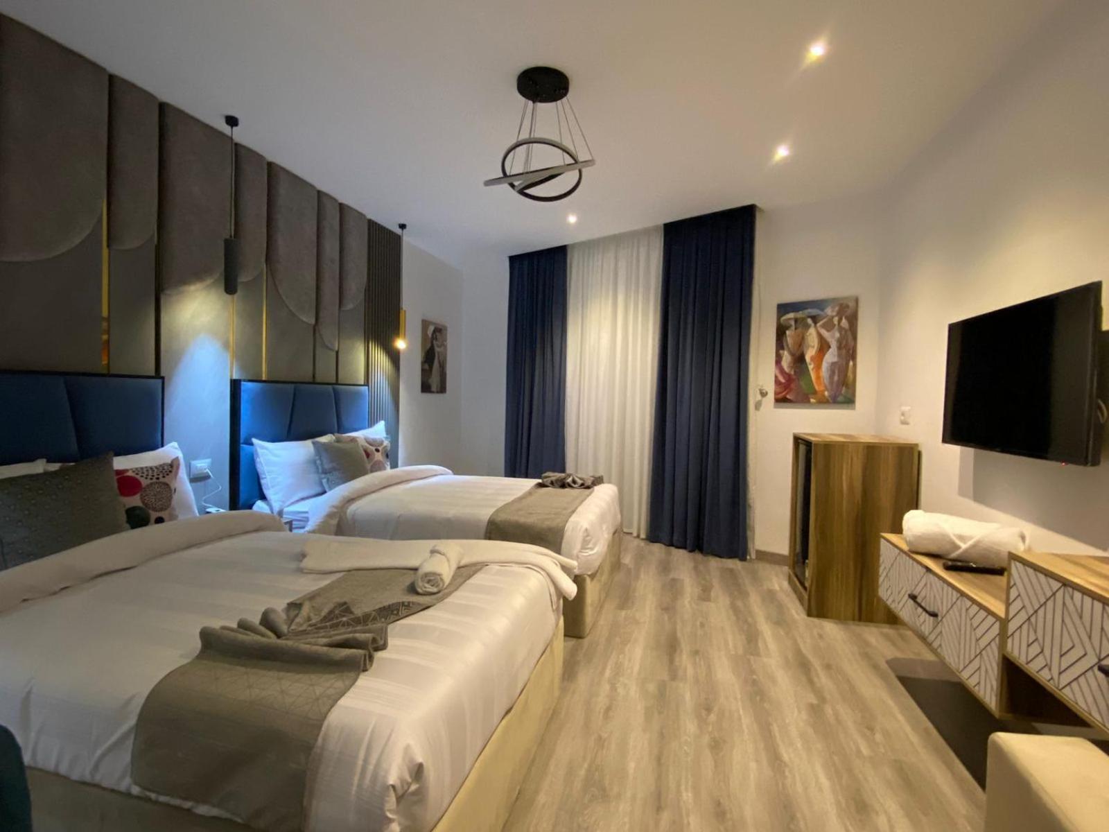 Elite Pyramids Boutique Hotel Kafrat al Jabal Bagian luar foto