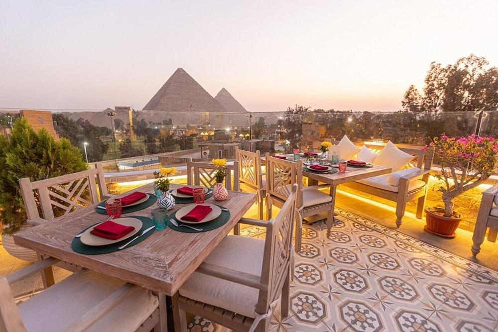 Elite Pyramids Boutique Hotel Kafrat al Jabal Bagian luar foto
